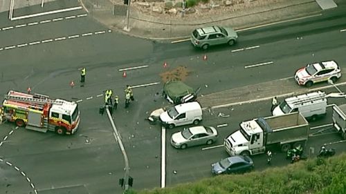 It is believed the car collided with a truck. (9NEWS Choppercam)