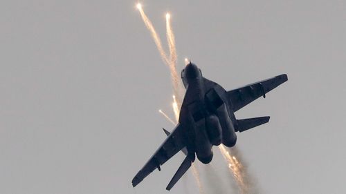 A Russian jet opens fire during last year's war games. 