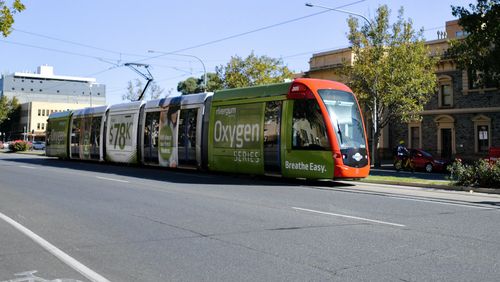 Trams like this one in Adelaide could soon be transporting passengers from the airport.