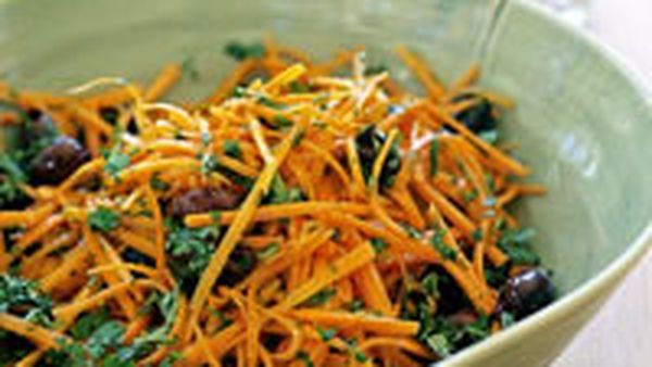 Carrot salad with olives, honey and cumin