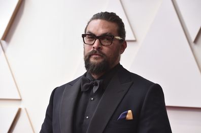 Jason Momoa arrives at the Oscars on Sunday, March 27, 2022, at the Dolby Theatre in Los Angeles. (Photo by Jordan Strauss/Invision/AP)