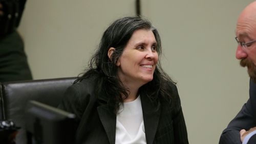 Louise Turpin, 49, smiles in court. (AAP)

