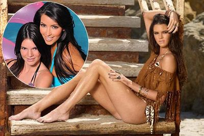 Kim's half sister 14-year-old Kendall Jenner's modeling career has kicked off with a set of photos already deemed inappropriate for a girl of her age. Kendall is actually wearing a bikini but some say the shoot is too racy as it looks like she has no pants on.