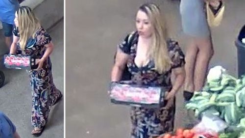 CCTV shows a woman believed to be Ms Earl at a nearby fruit shop. (Victoria Police)