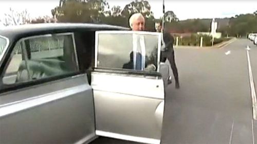 Clive Palmer Rolls up to parliament