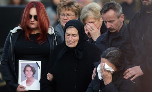 Mourners at Ms Dominic's funeral.