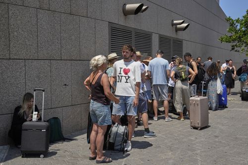 Citizens of Poland and Austria assemble at a hotel in Tel Aviv
