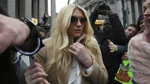 Kesha outside Manhattan Supreme Court. (AAP)