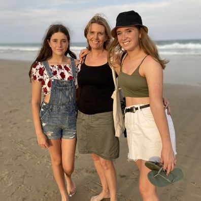 Anne-Marie Raymond with her two daughters