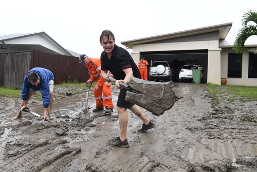 Andrew Hodgson cleans mud 