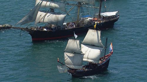 The Tall Ships race through Sydney Harbour on Australia Day.