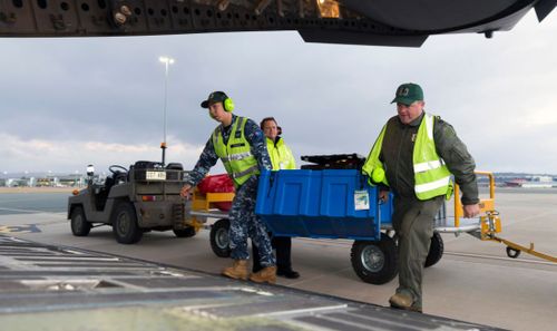 Australian police and military personnel are assisting with the search. Image: AAP