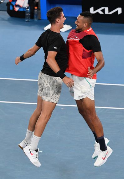 Thanasi Kokkinakis of Australia and Nick Kyrgios of Australia celebrate winning their Men's Doubles Final at the 2022 Australian Open at Melbourne Park on January 29, 2022 in Melbourne, Australia. 