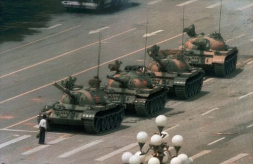 FILE - In this June 5, 1989 file photo, a man stands alone to block a line of tanks heading east on Beijing's Cangan Blvd. in Tiananmen Square.   Microsoft Corp. blamed accidental human error for its Bing search engine briefly not showing image results for the search term tank man on the anniversary of the bloody military crackdown in Beijings Tiananmen Square in 1989. Users in different parts of the world, including the U.S., said Friday, June 4, 2021 that no image results were returned when th