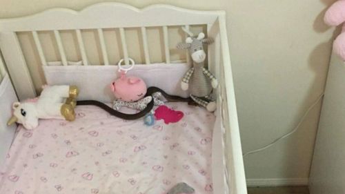 A Gold Coast mum has found a snake in her baby daughter's bedroom.