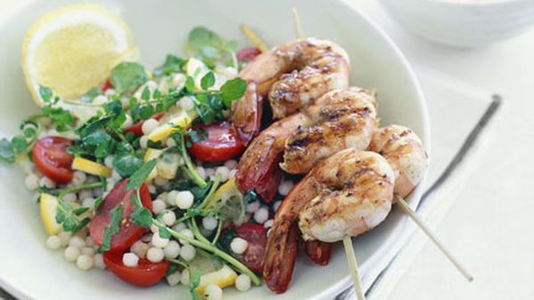 Warm moghrabieh salad with barbecued prawn brochettes and almond tarator