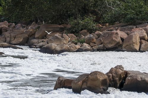 The foam is caused mostly by untreated household runoff from nearby Sao Paulo, the biggest city in Brazil. (AP Photo/Marcelo Chello)