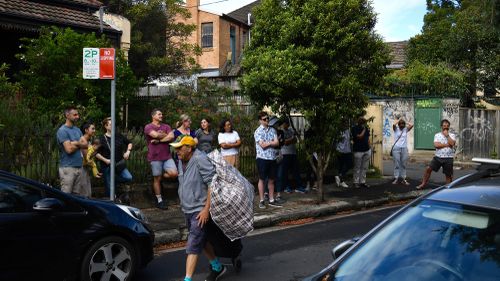 Buyers wait for an auction in Sydney.