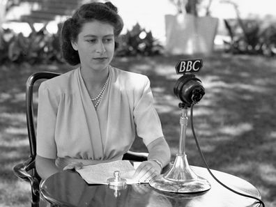Princess Elizabeth, later Queen Elizabeth II, poses in front of a microphone to make a 21st Birthday speech, April 21, 1947, which she made from Cape Town, South Africa. 
