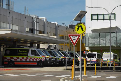 Ambulances near the entrance to the John Hunter Hospital. New Lambton Heights, NSW. 10th September, 2021. Photo: Kate Geraghty