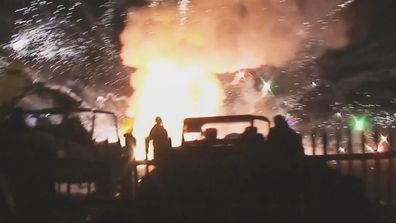 There was a large fire as fireworks exploded into the surrounding area.