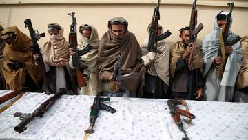 Former Taliban and IS militants surrender their weapons during a reconciliation ceremony in Jalalabad, Afghanistan.