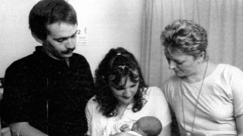 Colin Collier and Jennifer Collier with daughter Danielle Louise who was born on the lawn outside Newcastle hospital after the quake. On right is nursing unit manager Sister Julie Bridge who was present at the birth. 
