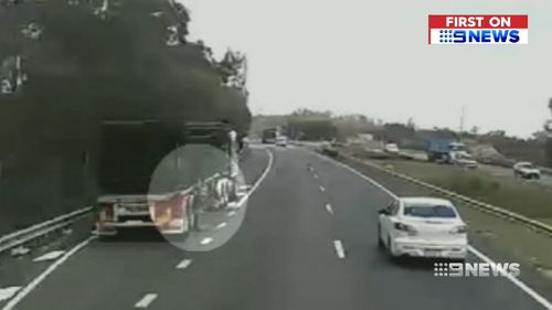 Mr Holland was securing a load on his truck when he was hit. (9NEWS)