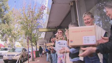 Book store uses human chain to relocate premises