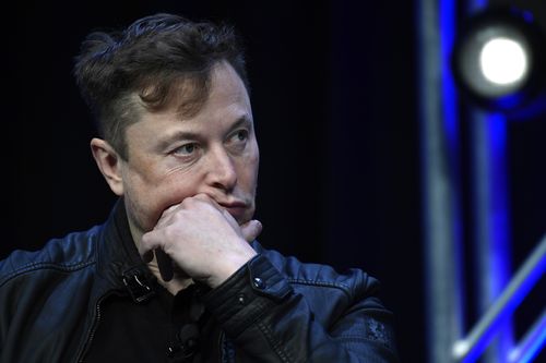 Tesla and SpaceX chief executive officer Elon Musk listens to a question as he speaks at the SATELLITE Conference and Exhibition in Washington, March 9, 2020