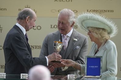 King Charles III and Camilla, the Queen Consort receive a trophy from the Duke of Kent during Ladies Day of the Royal Ascot horse racing meeting, at Ascot Racecourse in Ascot, England, Thursday, June 22, 2023 