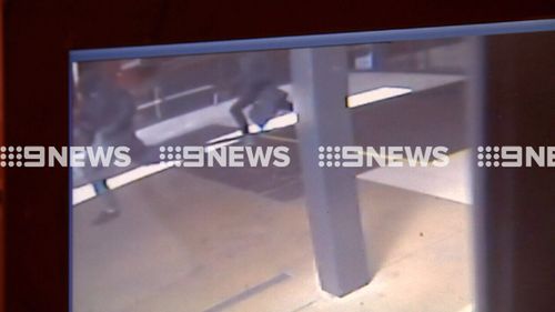 The masked robbers were caught on CCTV fleeing the scene. (9NEWS)