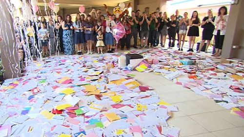 Members of the community turned out to celebrate with Hannah and see the thousands of cards sent from people across Australia and the world.