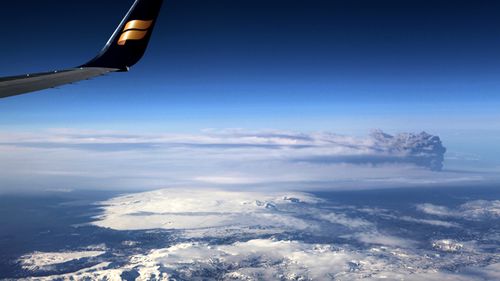 Seen from an Icelandair B-757 climbing out of Reykjavik taking a large detour from the erupting Eyjafjallajokull on May 16, 2010 in Reykjavik, Iceland. In the foreground, the glacier dome of sleeping giant volcano Katla. (Getty)