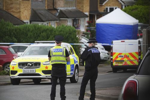 Police and emergency services at the scene in Ashlyn Close, after an incident on Tuesday evening, in Bushey, Hertfordshire, England, Wednesday, July 10, 2024. 