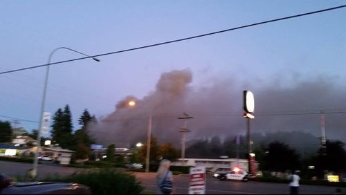 Smoke flumes from the explosion, seen from a distance. (Twitter/@joshfarley)