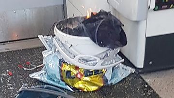 A white container was filmed burning inside a London Underground tube carriage at Parsons Green underground tube station after the attack. (Twitter/@sylvainpenne)