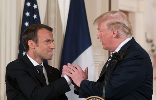 Presidents Donald Trump and Emmanuel Macron have bonded over their nation's efforts in the Middle East. (AAP)
