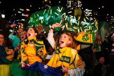 Australian fans celebrate as the Matildas beat Denmark