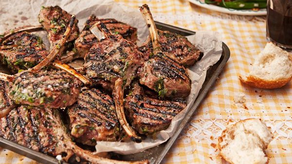 Minted spring lamb cutlets with yellow squash, tomato and bean salad