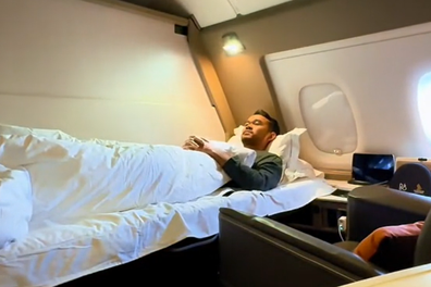 Singapore Airlines First Class suite with flat bed