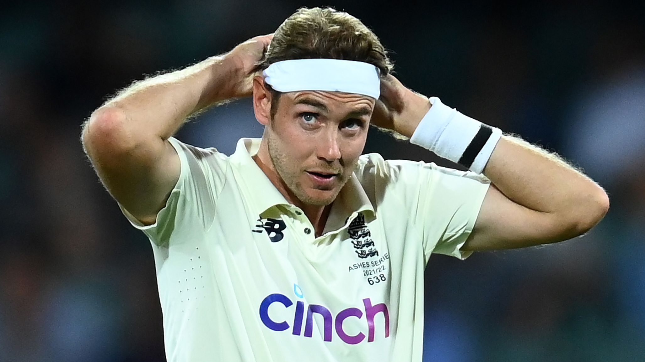 ADELAIDE, AUSTRALIA - DECEMBER 16:  Stuart Broad of England adjusts his headband during day one of the Second Test match in the Ashes series between Australia and England at the Adelaide Oval on December 16, 2021 in Adelaide, Australia. (Photo by Quinn Rooney/Getty Images)
