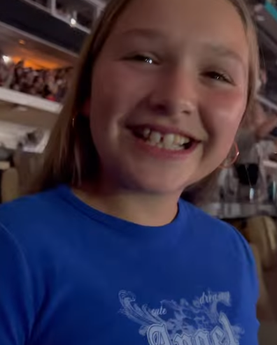 11-year-old Harper Beckham all smiles at The Weeknd's Miami concert, August 2022.