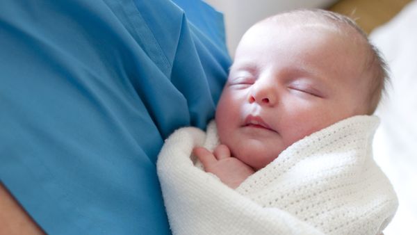 Welcome to the world little one. Meet your midwife. She helped to bring you here. Image: Getty.