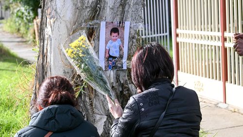 Family members turn up at the scene in Sunshine North where a three year old died from a car accident outside a childcare centre.