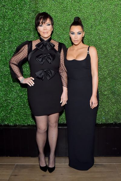 Kris Jenner in Givenchy, and Kim Kardashian West in Versace, at the KKW x Mario dinner in Beverly Hills, March, 2018