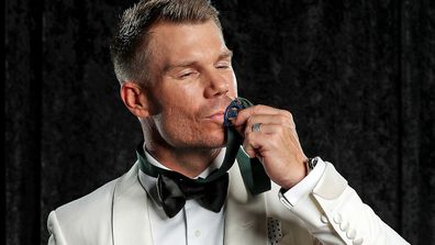 David Warner poses with the Allan Border Medal