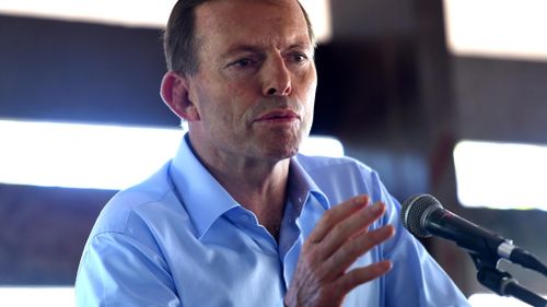Tony Abbott talks to students at Yirrkala School at Yirrkala on the Gove Peninsula, Northern Territory during a visit to Arnhem Land.