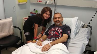 Chloe Karis with her dad in hospital.