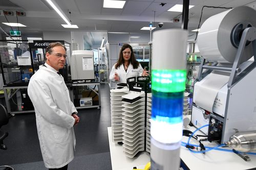 Federal Health Minister Greg Hunt (left) tours the National Drug Discovery Centre at the Walter and Eliza Hall Institute of Medical Research in Melbourne. The Federal Health Minister Greg Hunt has announced $66 million in Coronavirus related research which includes $30 million already pledged.